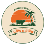 A logo featuring a cow, a palm tree, and an orange sun with the text “Nature Coast Soils Premium Organic Cow Blend.”.