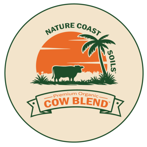 A logo featuring a cow, a palm tree, and an orange sun with the text “Nature Coast Soils Premium Organic Cow Blend.”.